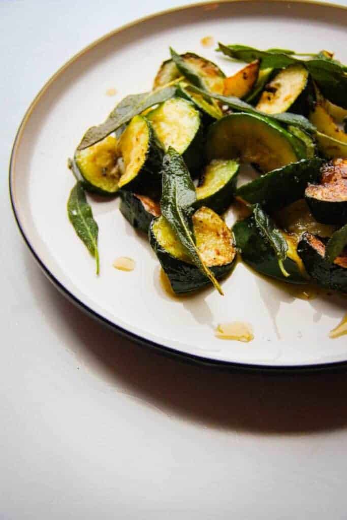 Courgette sage and garlic on a plate.