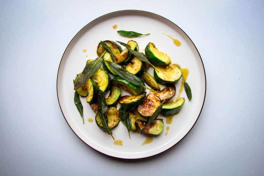 Fried courgette in a garlic oil with crispy sage and black pepper.