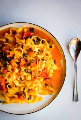 A butternut squash pasta with chili and parmigiano reggiano cheese.