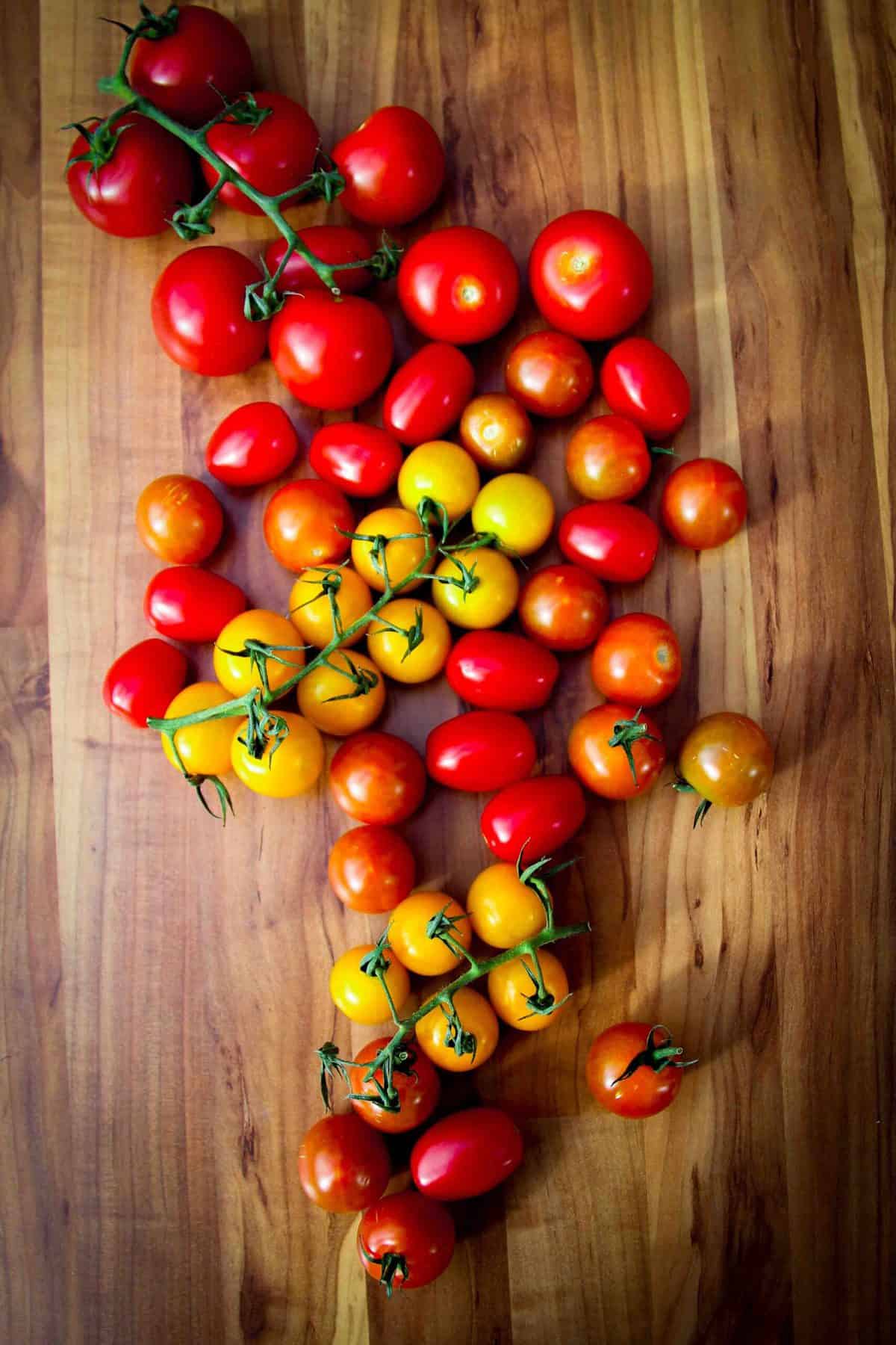 Tomatoes on a wooden board.