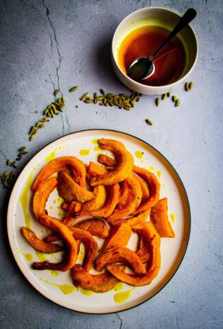 Roasted Kabocha Squash with Cardamom-infused oil on the side.