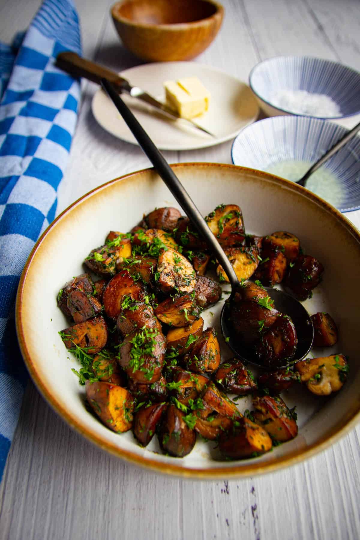 Sauteed chestnut mushrooms with butter, parsley, garlic and lemon.