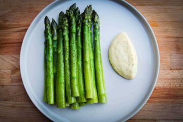 The finished green asparagus with citrus mayo.