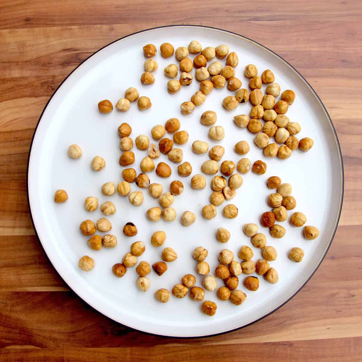 A plate of toasted hazelnuts