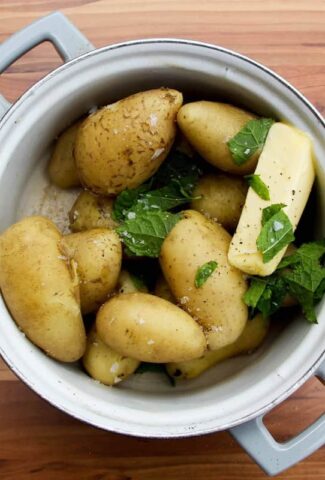 Boiled new potatoes with butter and mint.