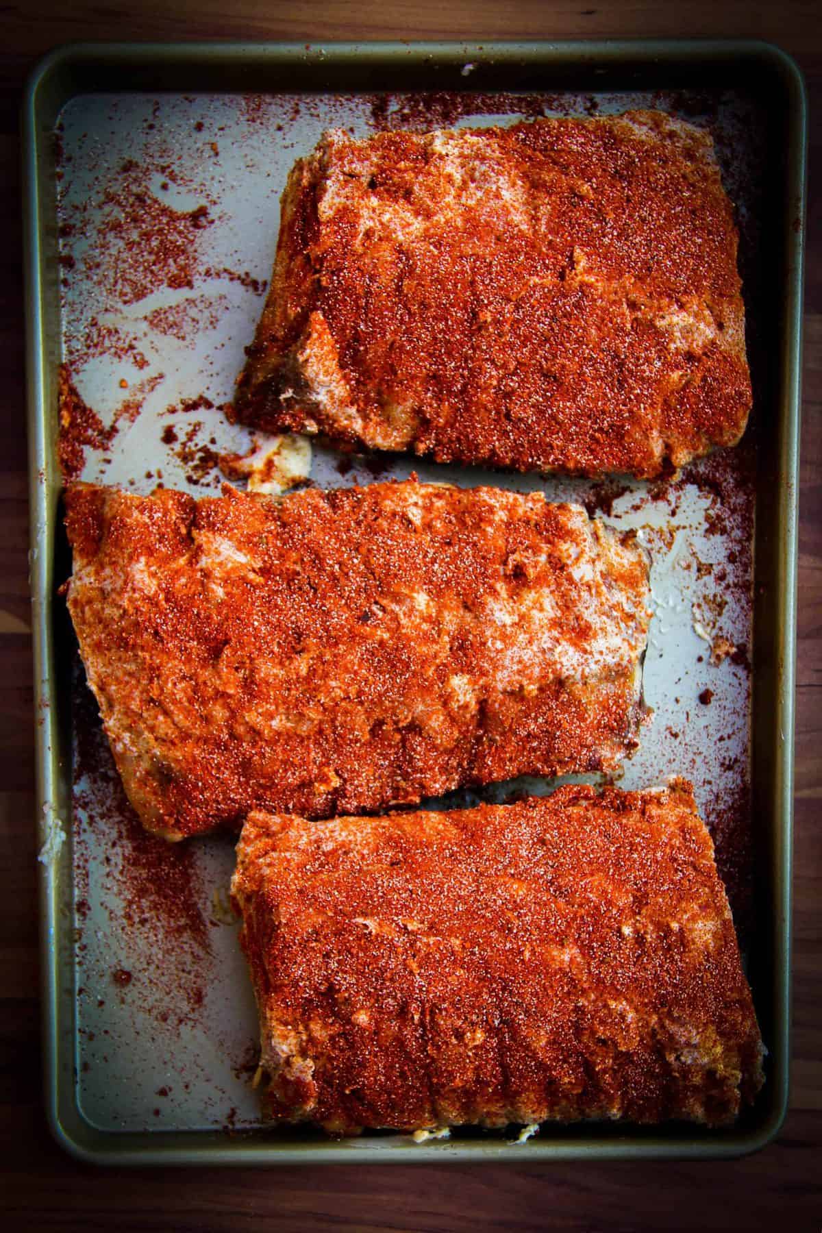 Spicing the ribs up with the secret spice blend.