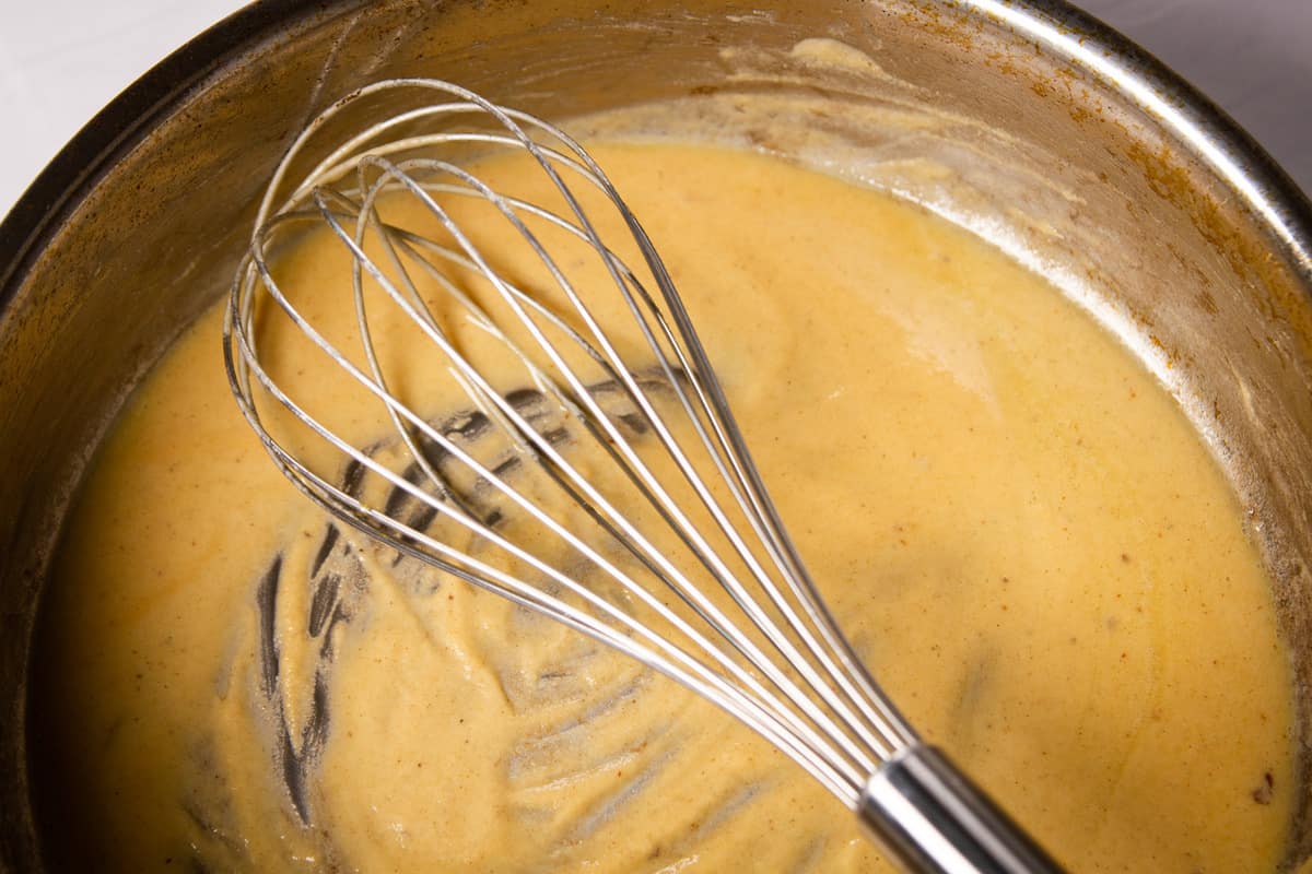 Making a blonde roux in the pan.