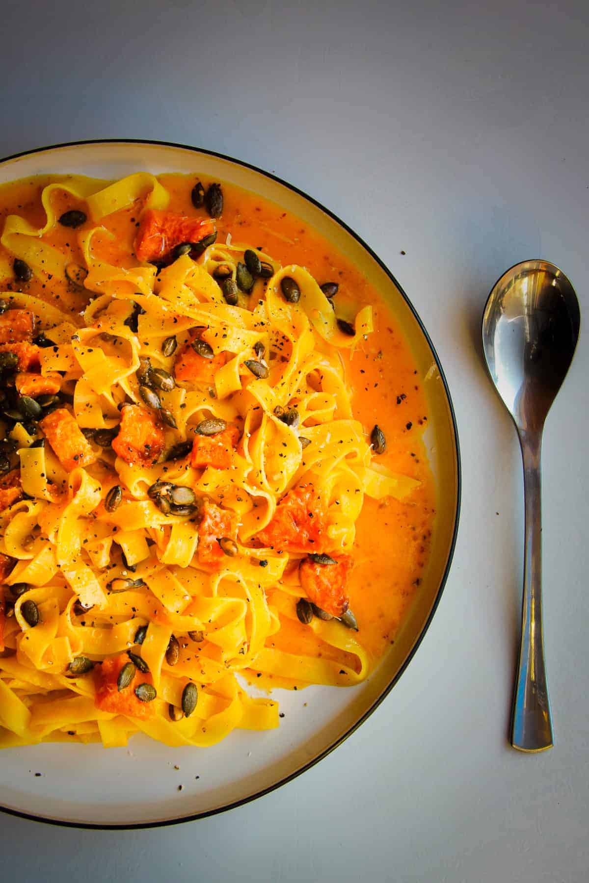 Butternut squash pasta with chili and toasted pumpkin seeds.