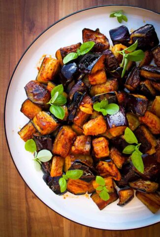 Vegan olive oil fried eggplant dish with garlic, lemon, chili and smoked paprika.