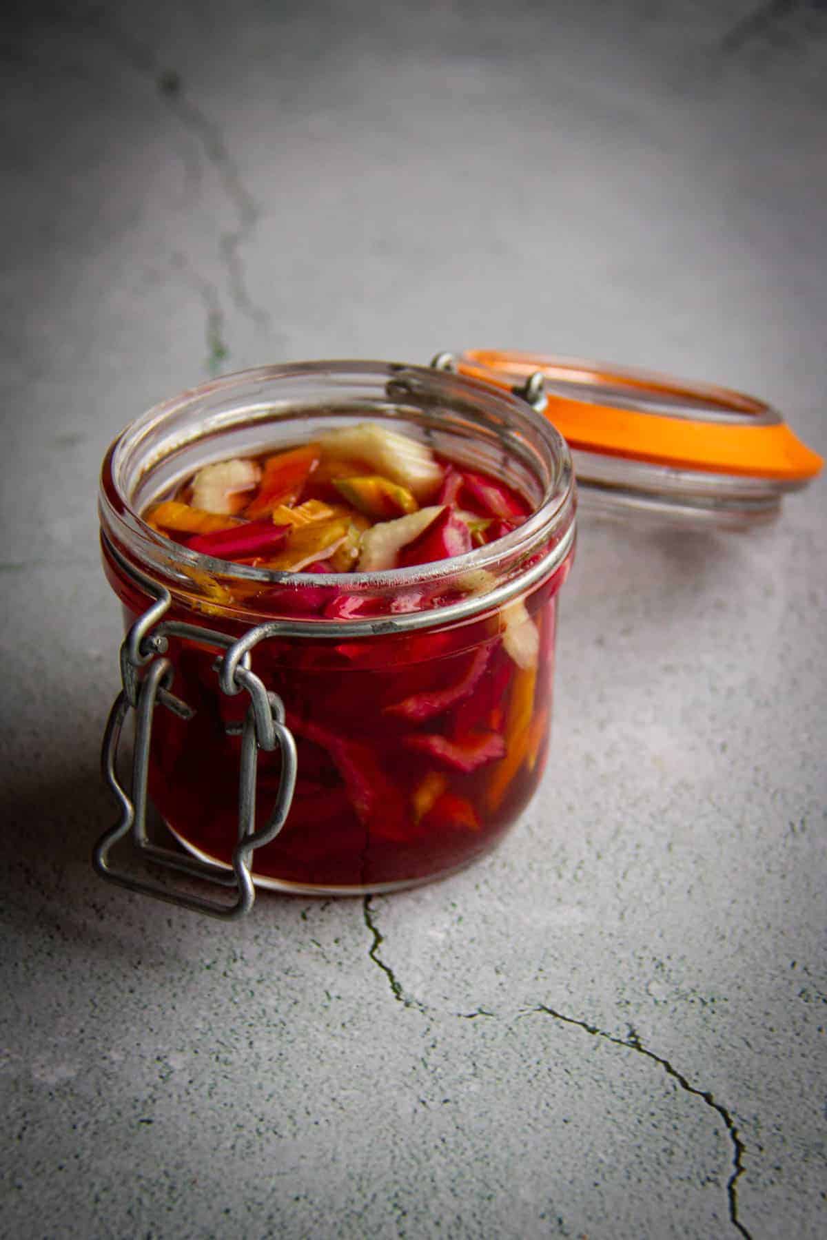 The pickled chard stems in a little mason jar.
