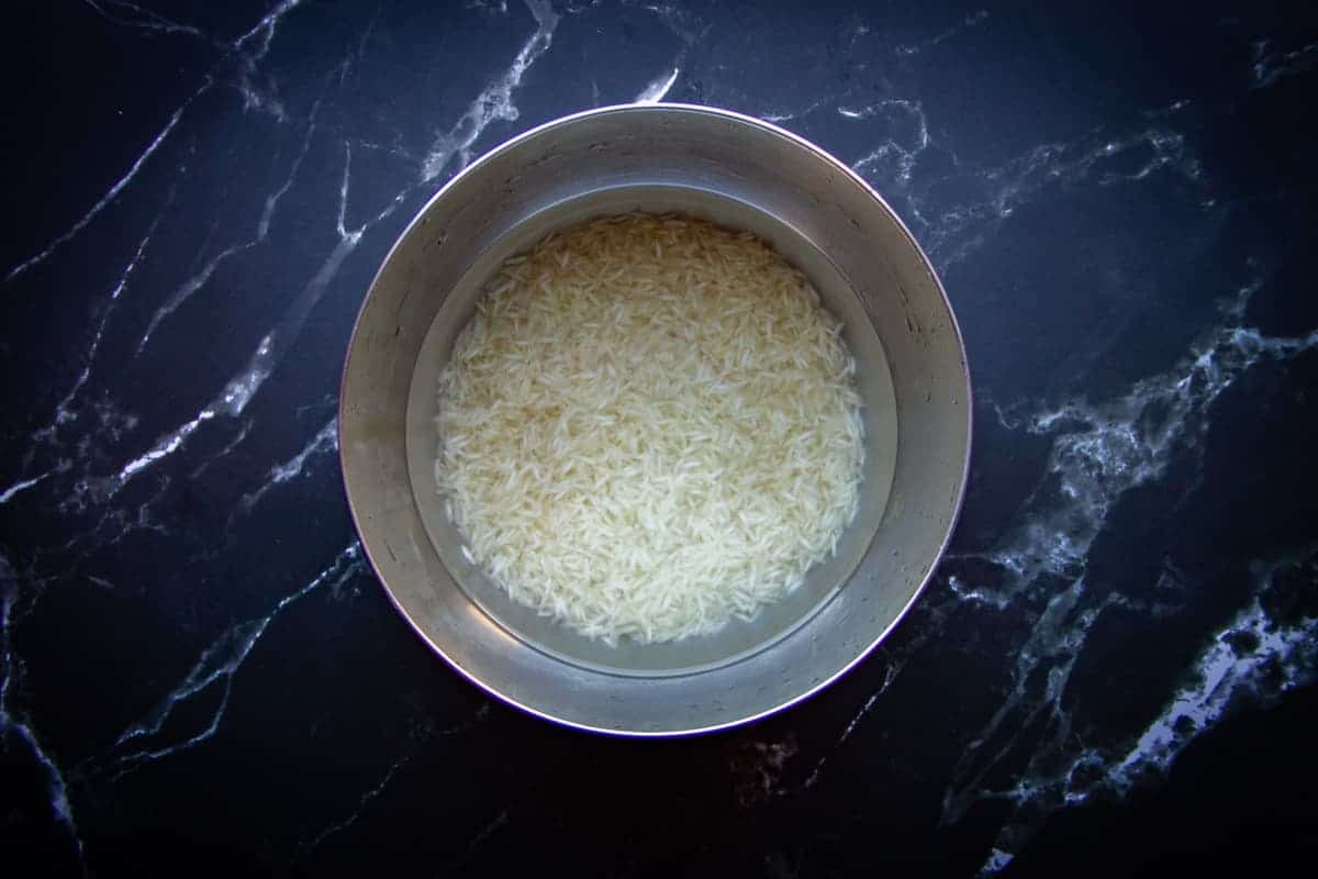 The soaked rice in clear water.