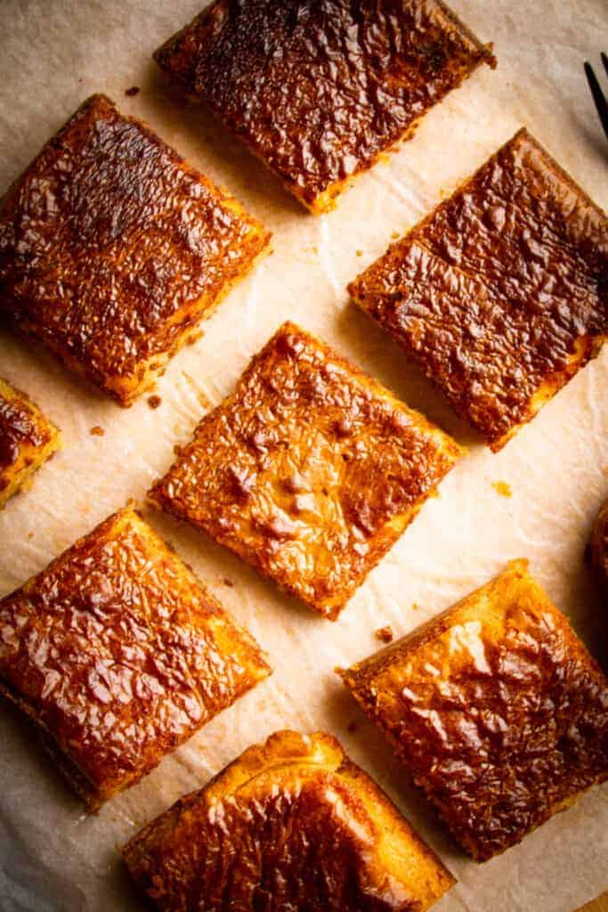 Vanilla Brownies aka blondies on a board.