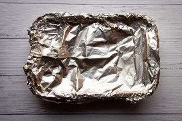 covering-the-chicken-with-a-tin-foil-lid.
