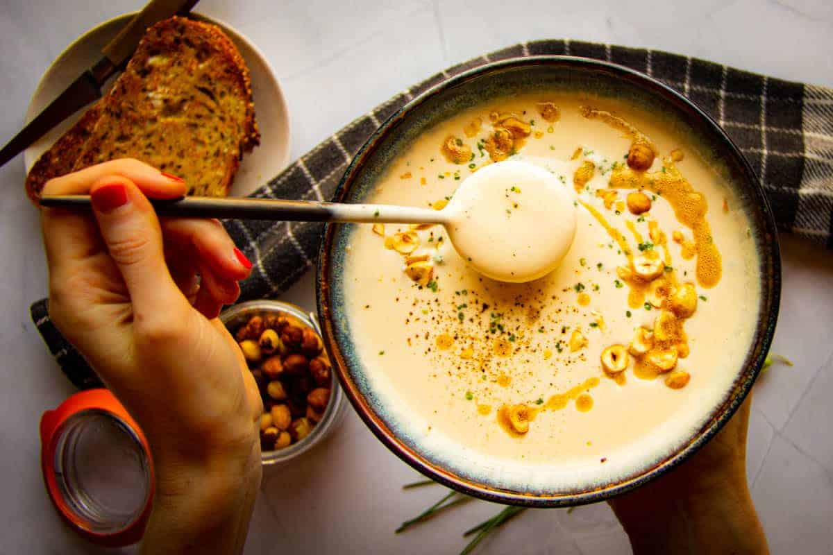 white asparagus soup with brown butter and hazelnuts