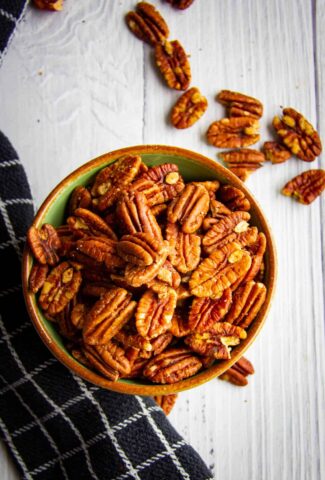 Toasted pecans in a bowl.