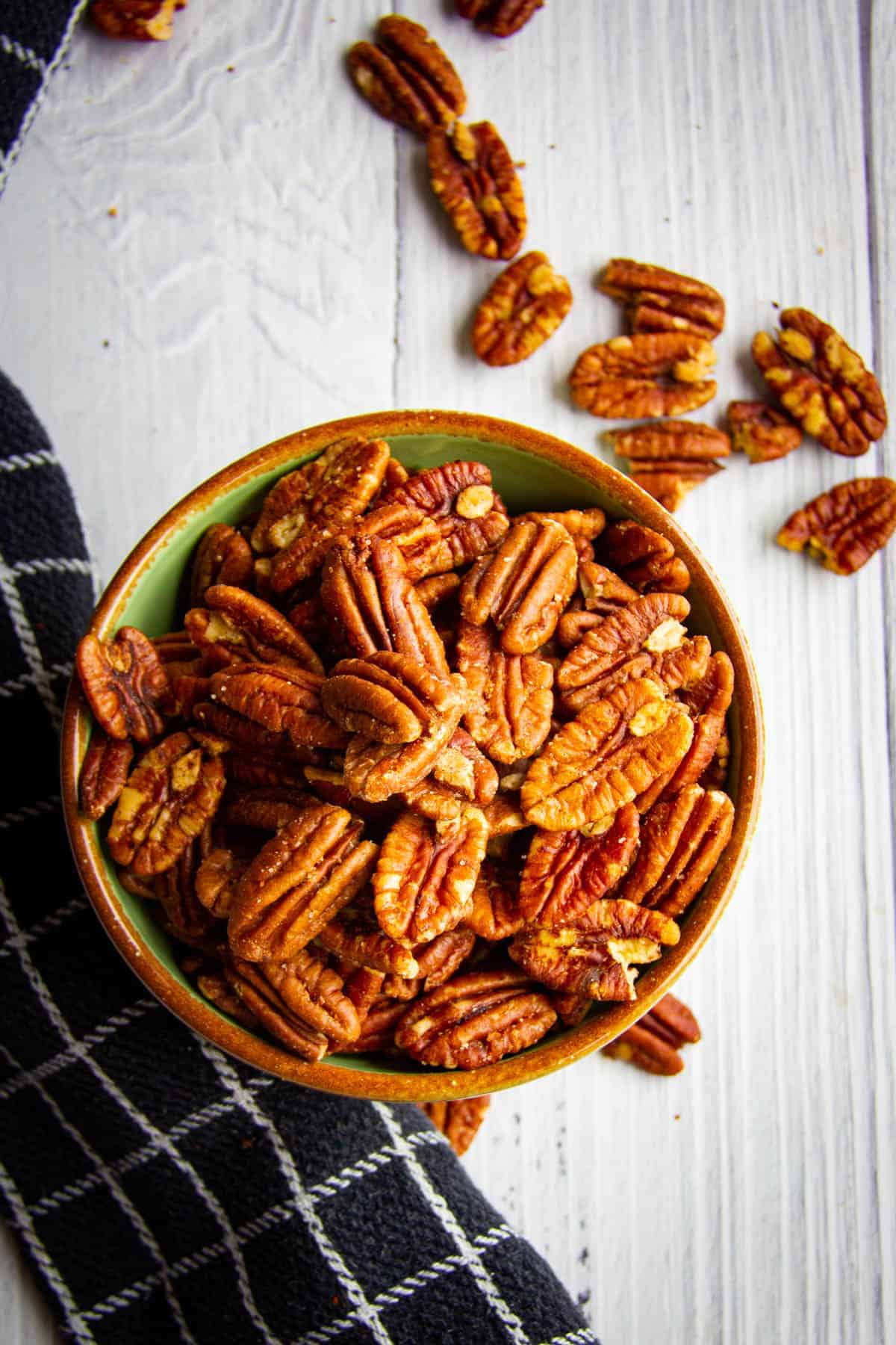 Toasted pecans in a bowl.