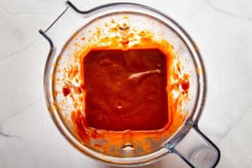 Blending the bbq sauce until smooth in the Vitamix.