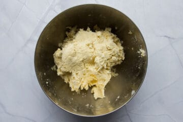 Forming the pie crust in a bowl.