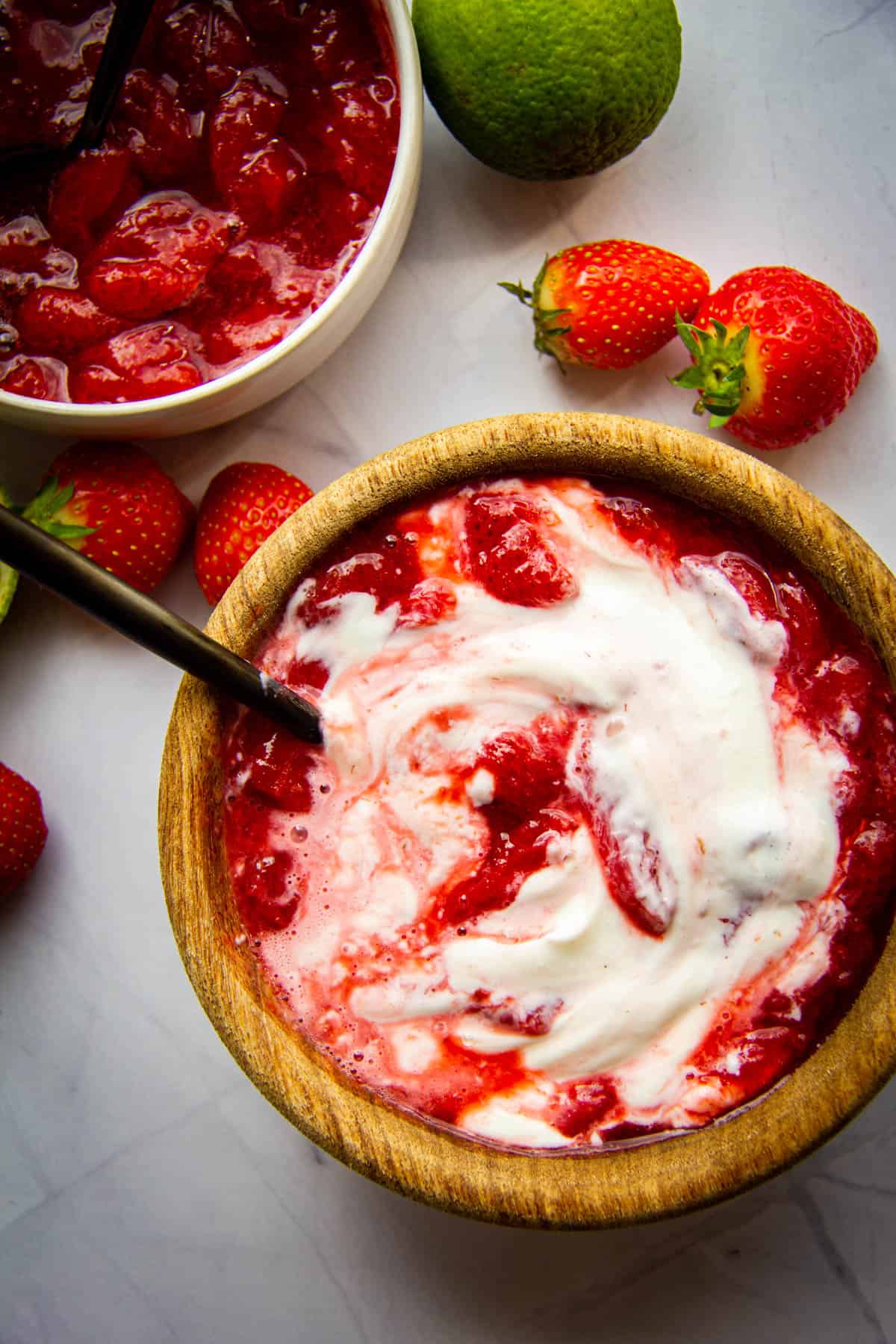 Strawberry sauce with yogurt mixed together.