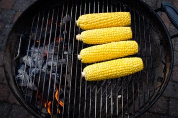 Smoking the corn on indirect heat.