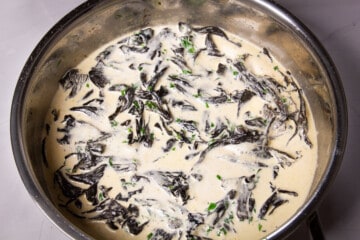 Finishing the sauce with cream.