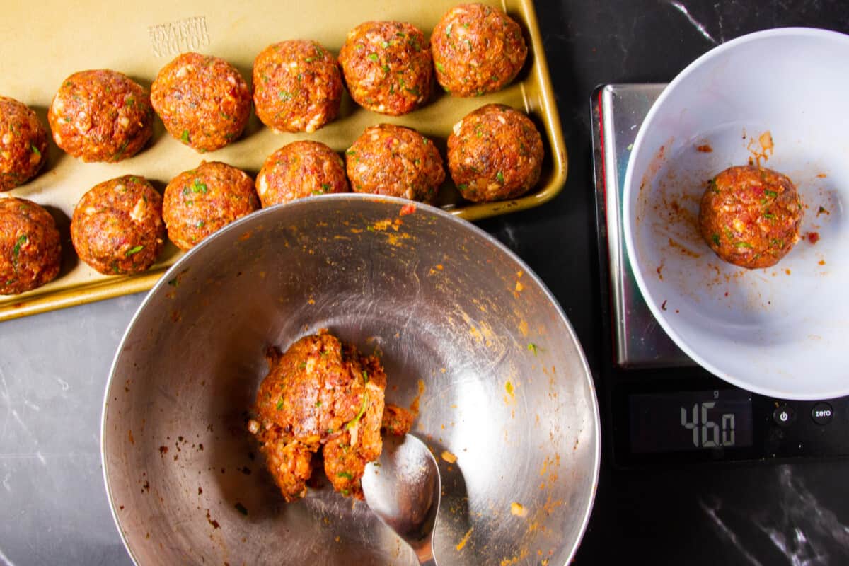 Rolling the meatballs without breadcrumbs.