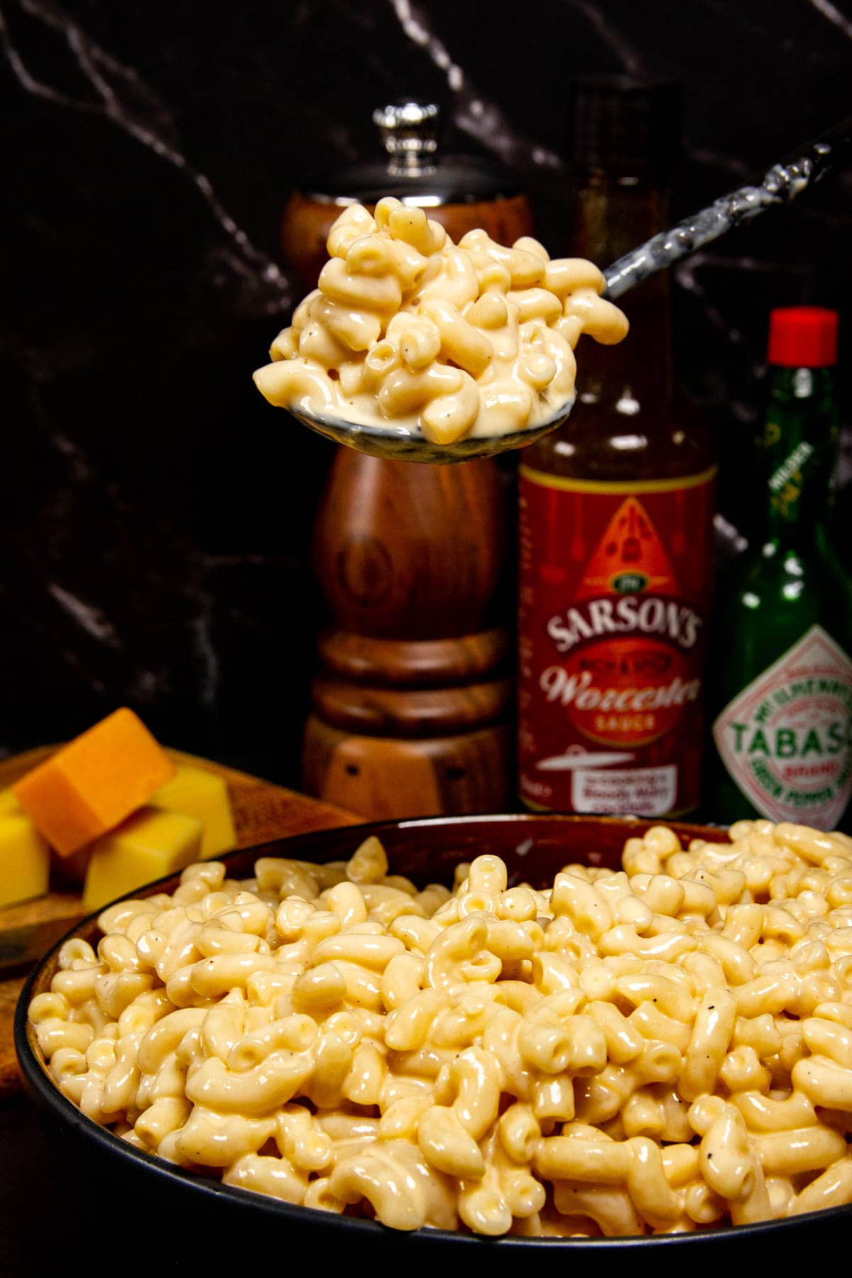 Mac and cheese on a spoon.