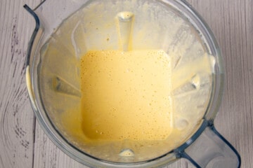 The cheese sauce in a blender jar.