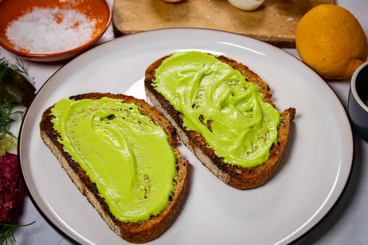 The bright green pea puree on the buttered toast.