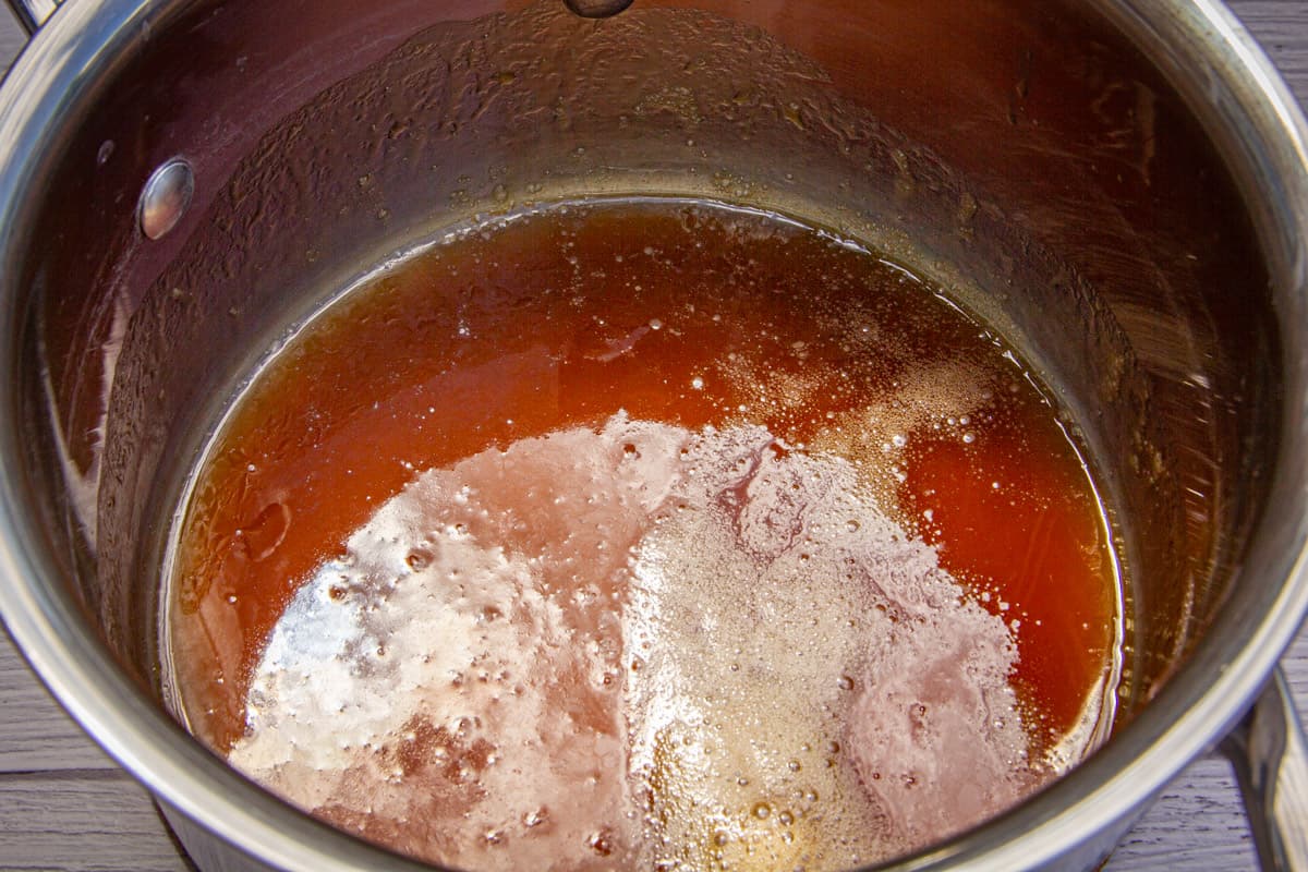 The maple glaze in a pot.