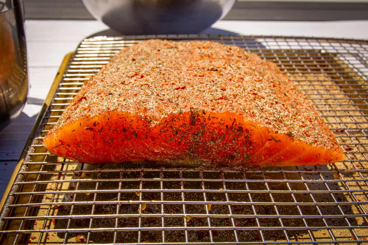 THe salmon covered in the glaze and spice rub.