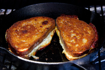 The grilled cheese sandwiches with a beautiful golden brown crust.