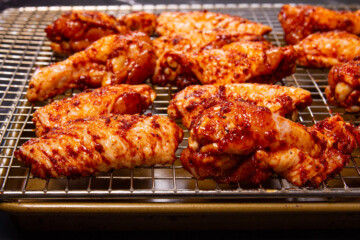 Drying the wings on a resting rack.