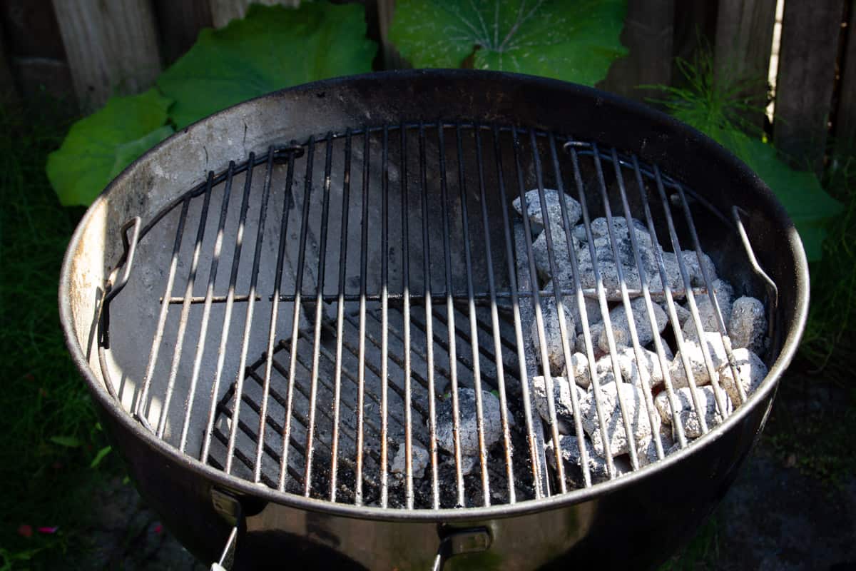 Lighting up the charcoal grill.
